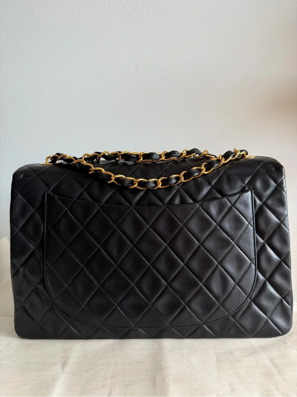 CHANEL Black Quilted Shoulder Bag with Gold Chain & CC Lock